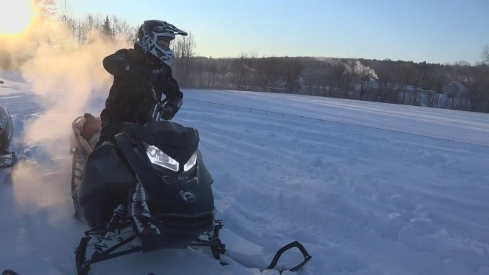 Maine kids snowmobile to school