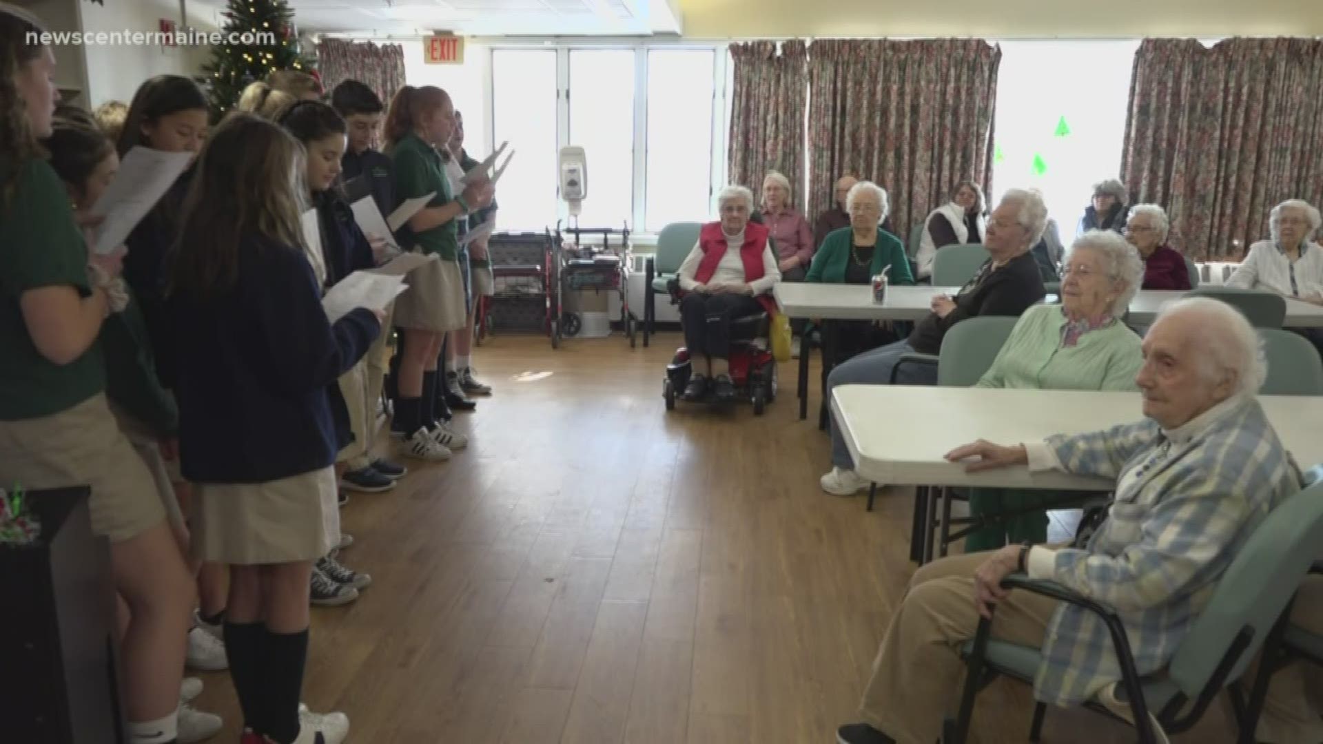 Students stepping up and making a difference in the lives of their older neighbors at The Phillips Strickland House where 45 seniors live together, but independently
