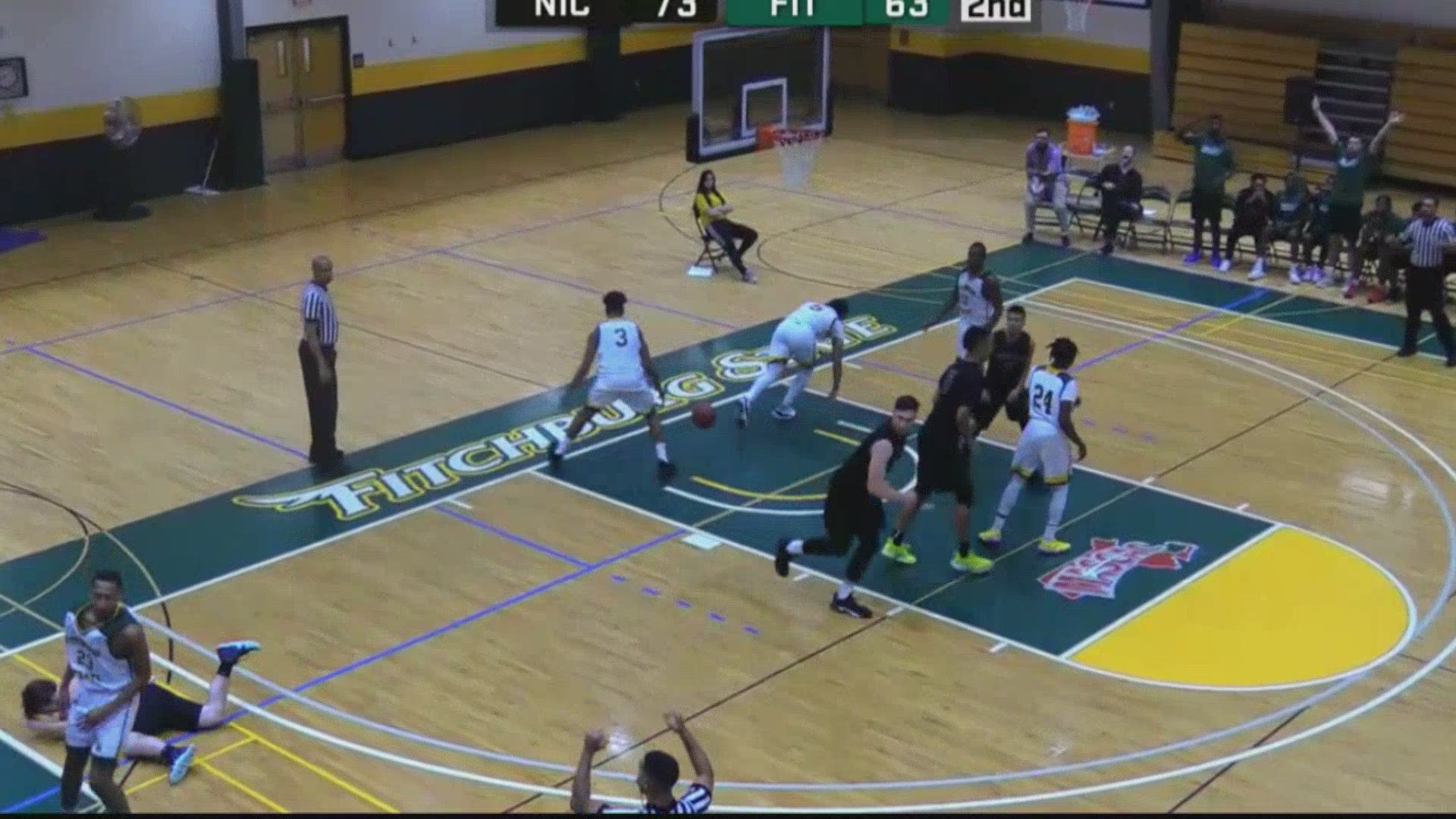 A Fitchburg State University basketball player has been suspended after he intentionally knocked out an opponent with an elbow to the face Tuesday night.