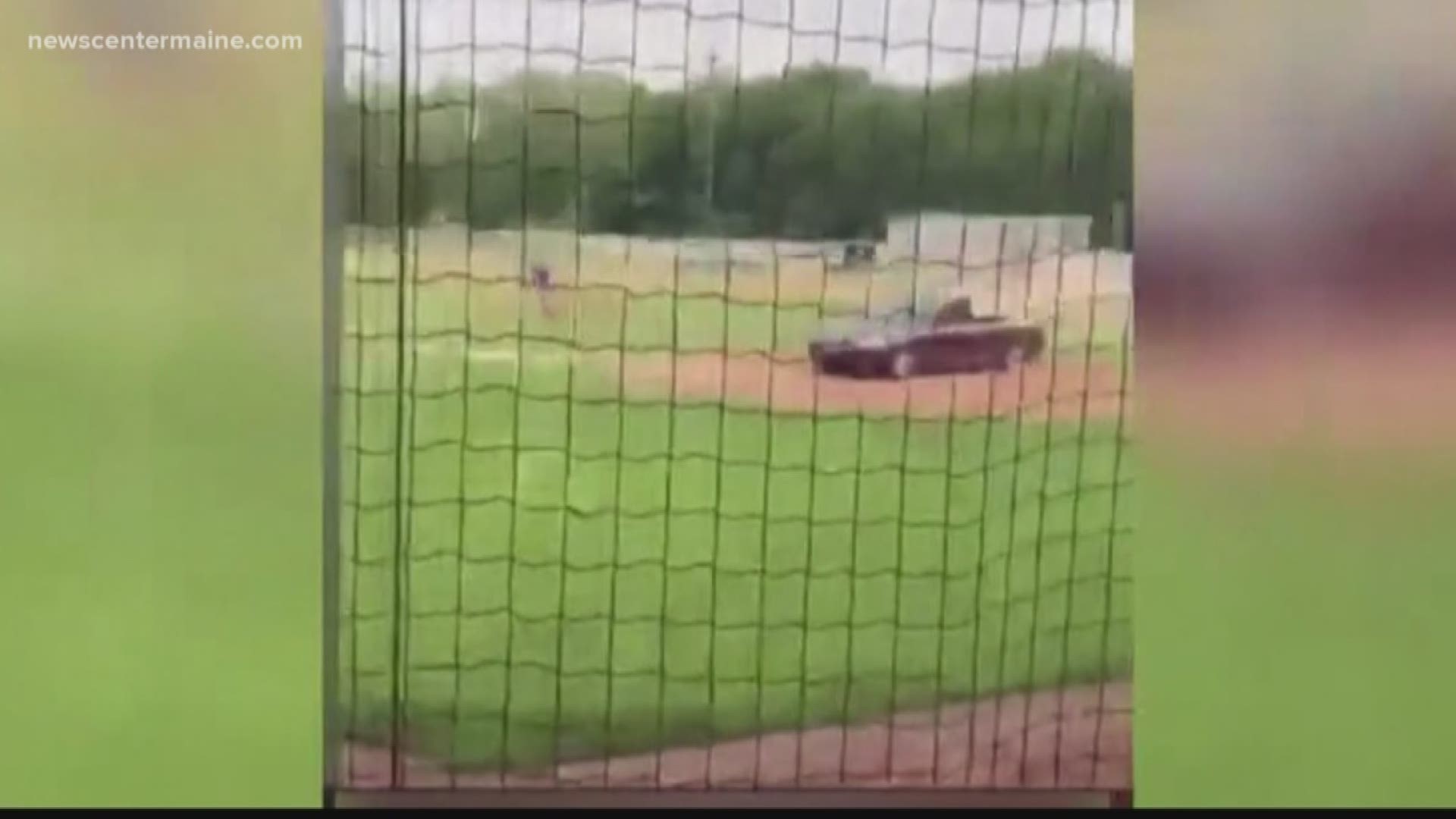 Man dies after women crashes car into ballpark