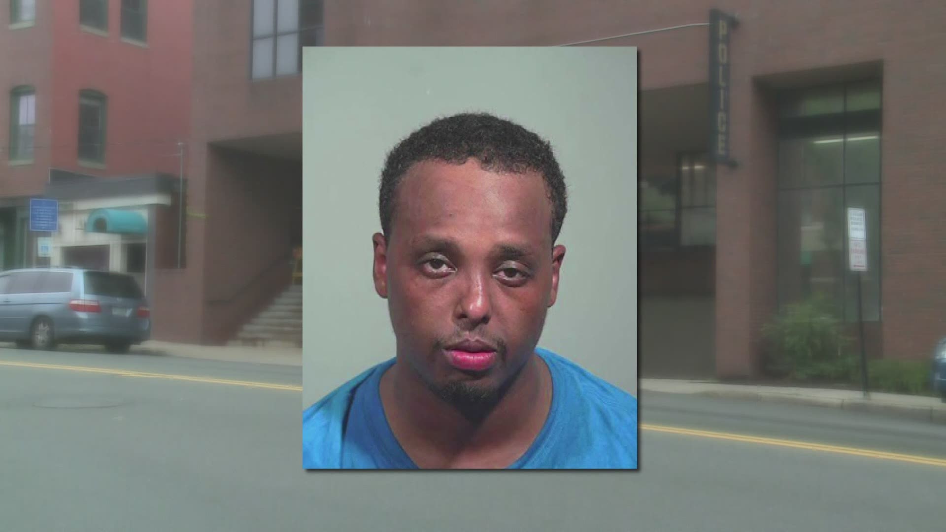 Abdikareem Hassan is accused of shooting into the Portland police department's parking garage last summer is pleading not guilty to his charges.