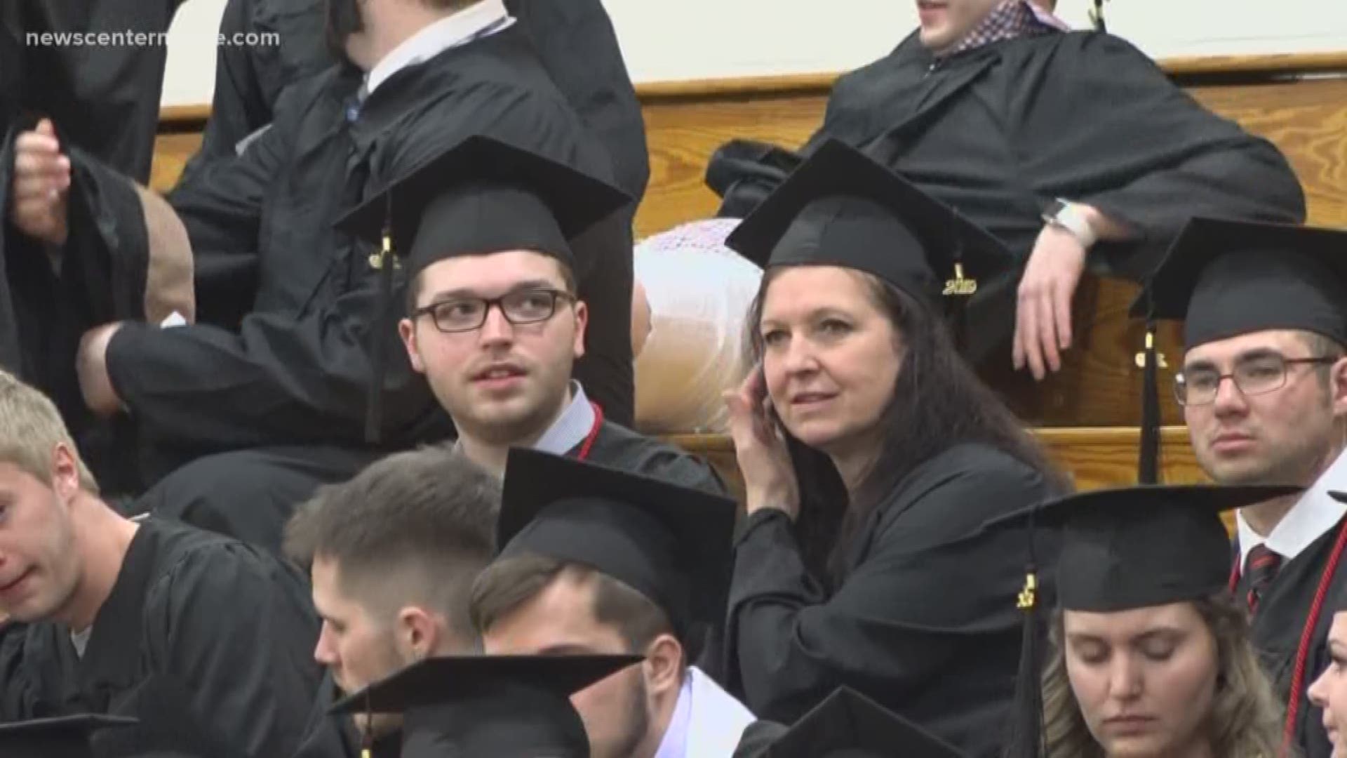 Mother and Son share graduation day at Thomas College.