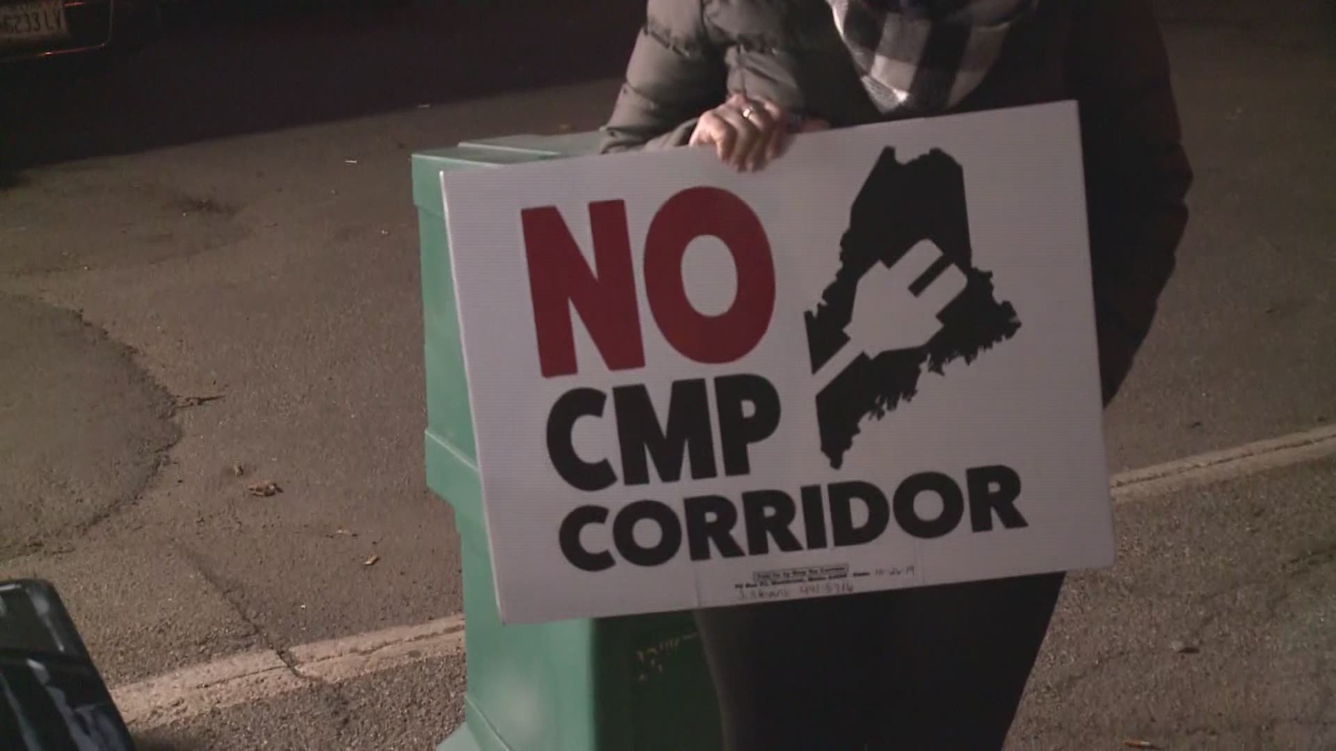 Volunteers with "No CMP Corridor" were outside Bath Iron Works' collecting signatures on a petition against Central Maine Power's Transmission line project.