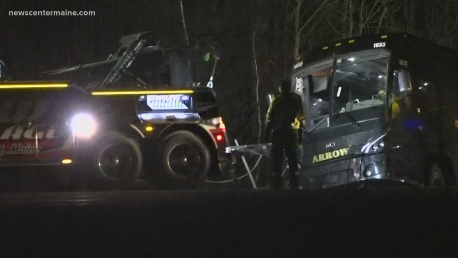 Maine State Police say a tour bus headed to Orono for a Christmas concert crashed on I-95 in Burnham late Tuesday night, injuring four people.