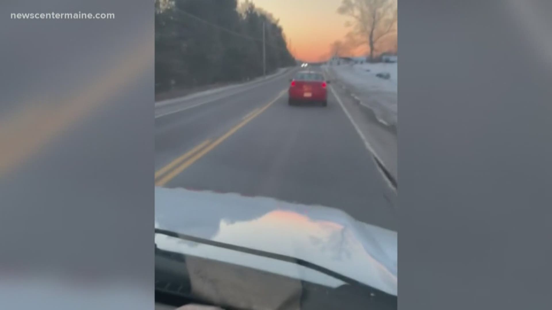 Driver fails to pull over for ambulance.