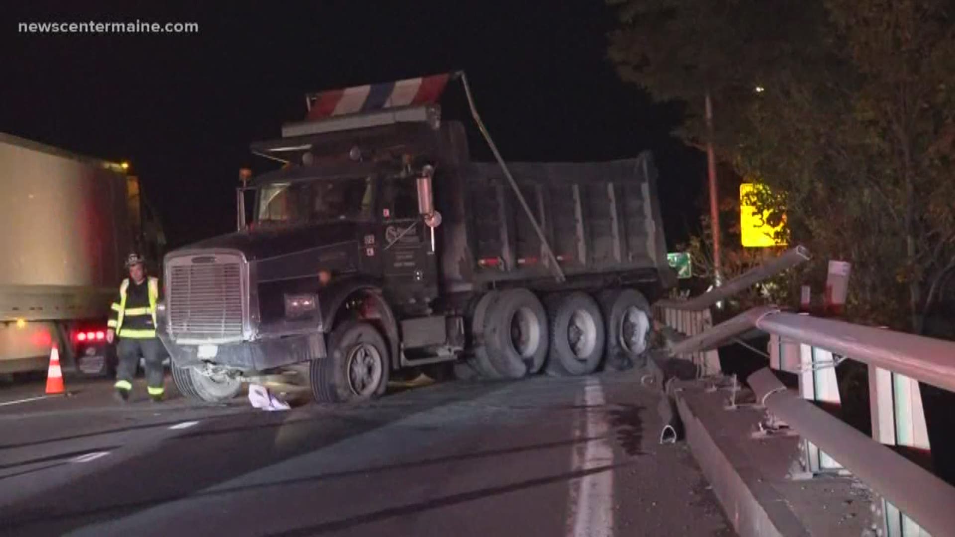 A construction truck broke through a guard rail and almost went off the overpass on I-95 over Broadway.