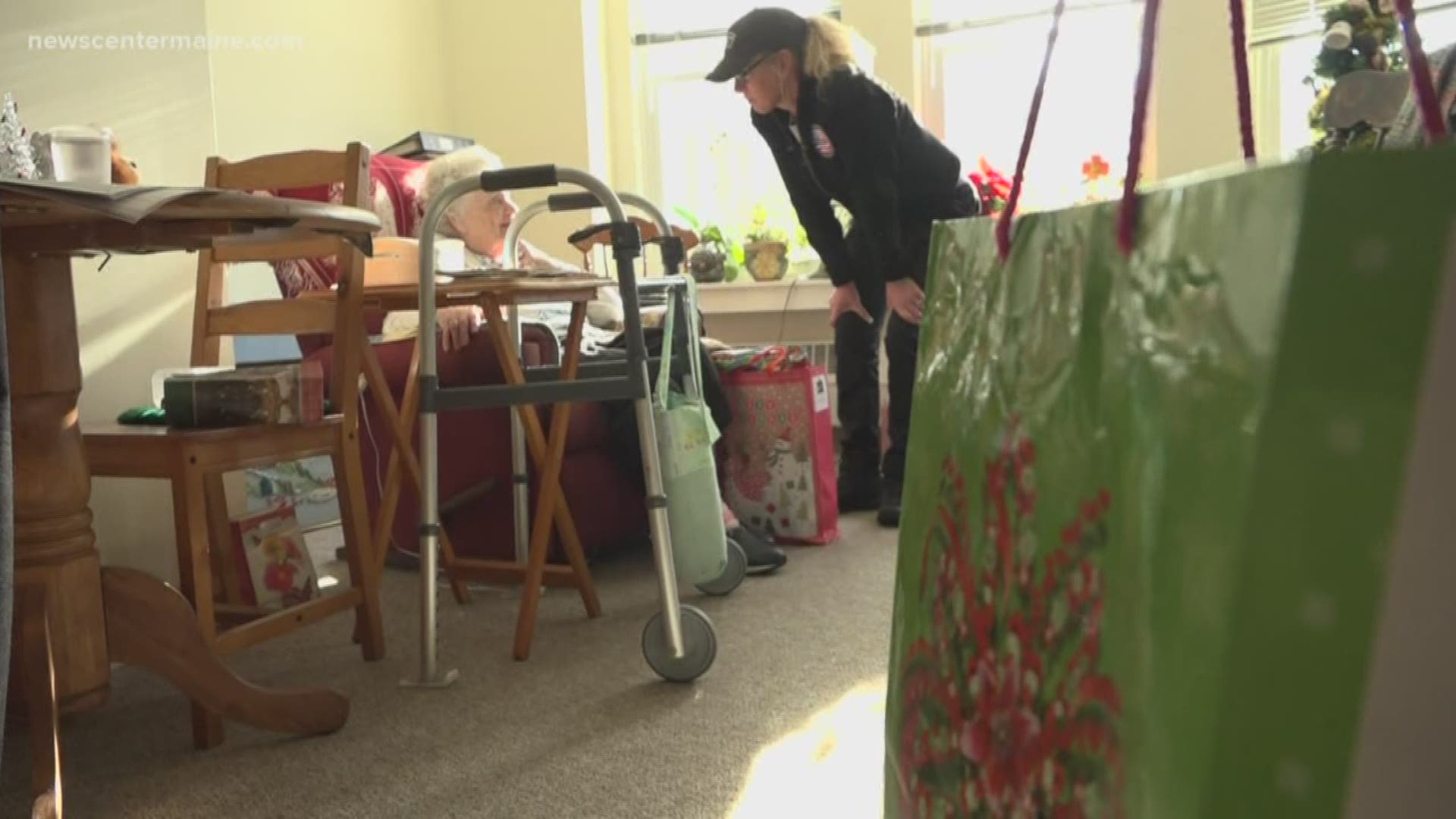 Police officers play Santa to seniors in need