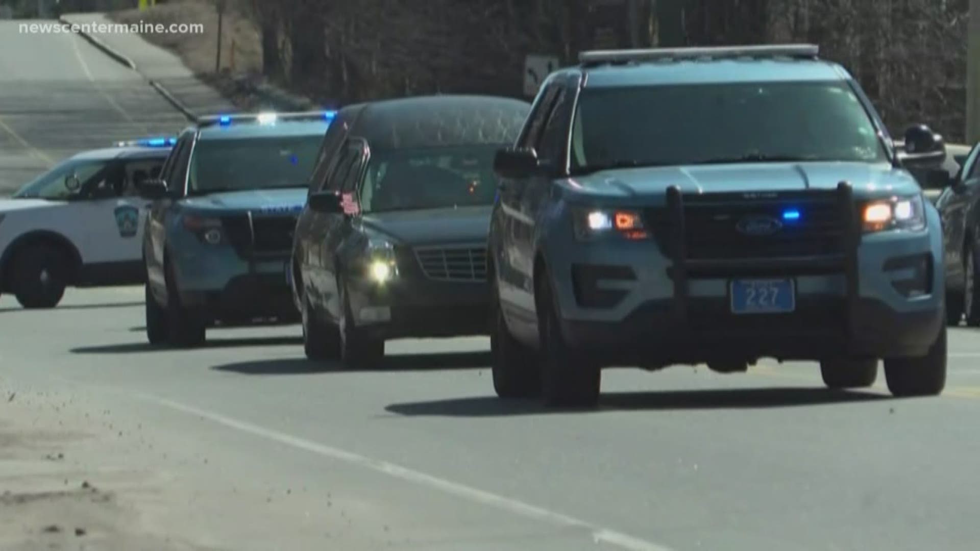 Maine State Police Det. Benjamin Campbell's body returns home to Millinocket after arriving at a funeral home by procession Thursday evening.