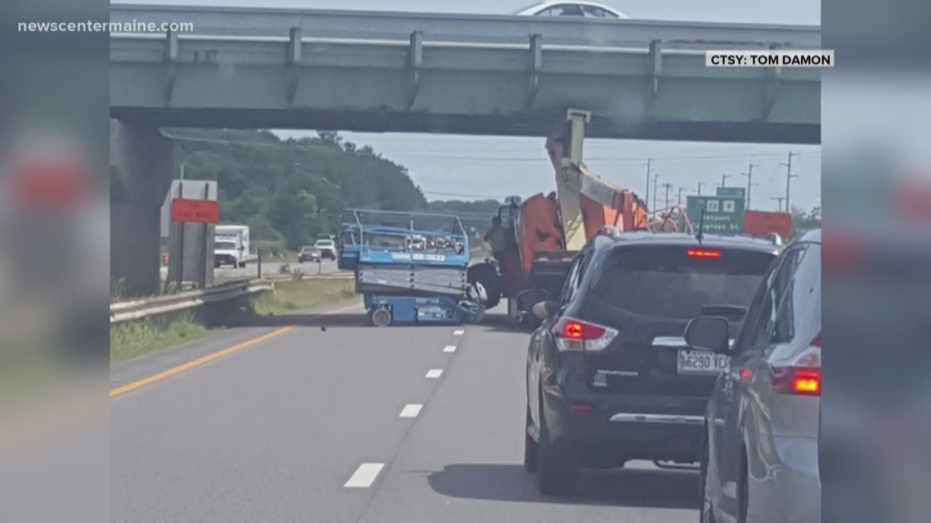 Crane hits overpass on Turnpike in South Portland