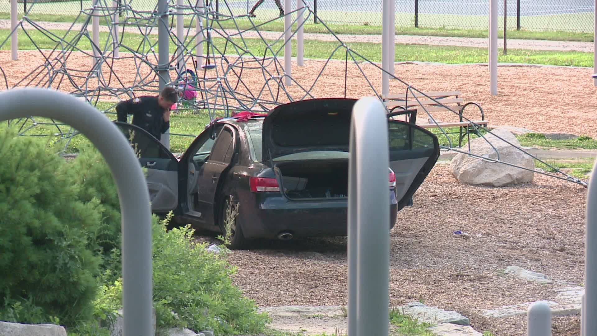 Police are investigating after a car drove into baseball stands and through a park in Portland