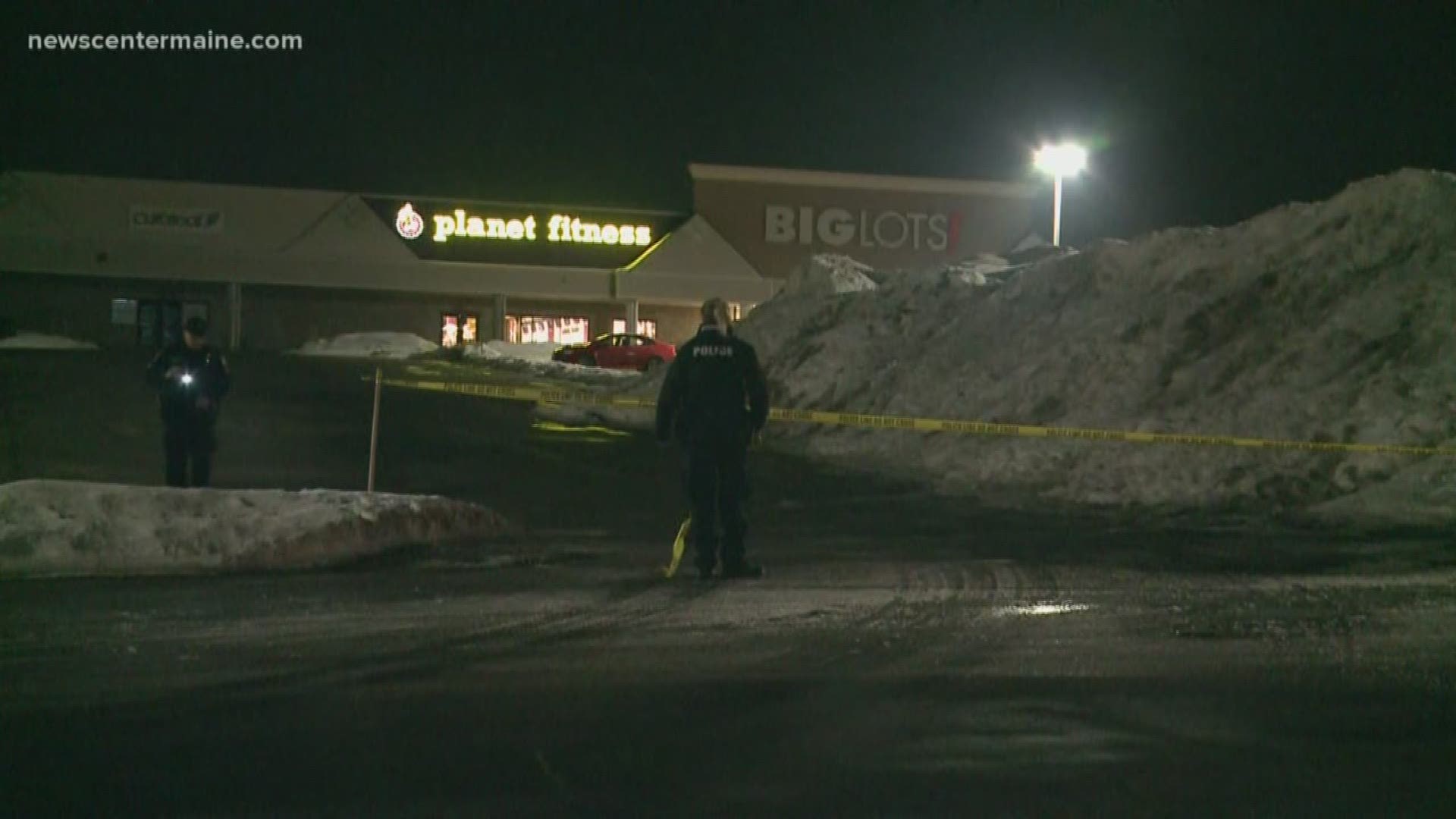 A person is in the hospital after an overnight robbery and shooting in the parking lot of Auburn Plaza.