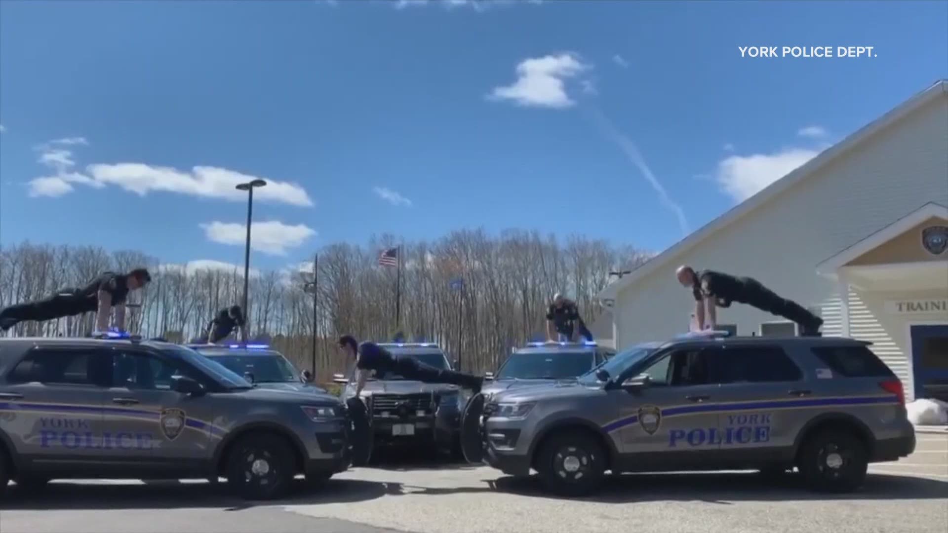 Maine police officers do push-ups on top of cruisers (and other places) to raise awareness of veteran suicide
