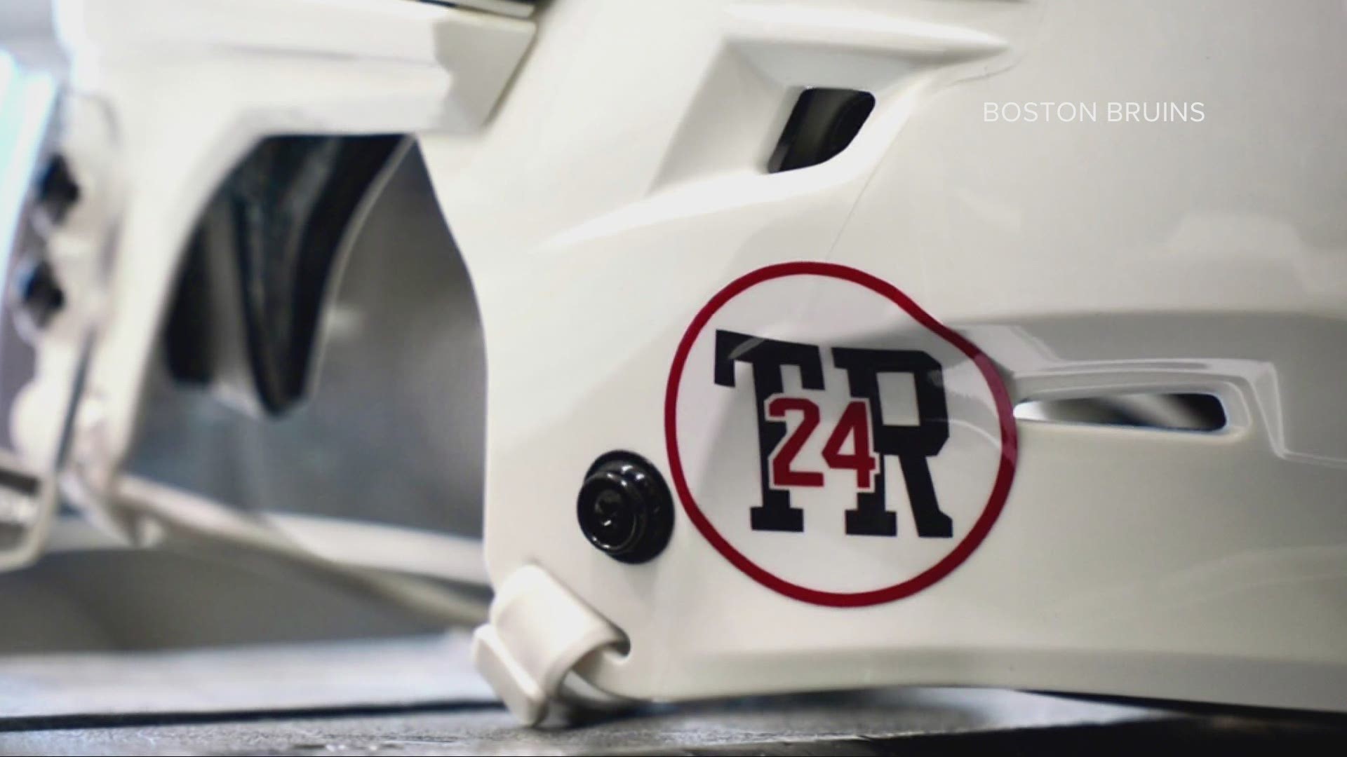 The Boston Bruins are just one of several New England hockey teams who are honoring the late Travis Roy this season.