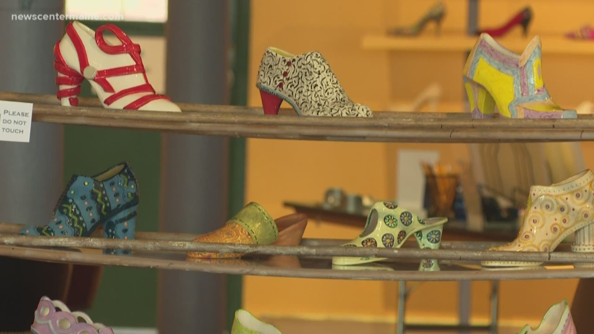An exhibit at Museum L-A in Lewiston features shoes made by immigrants in Maine mills.