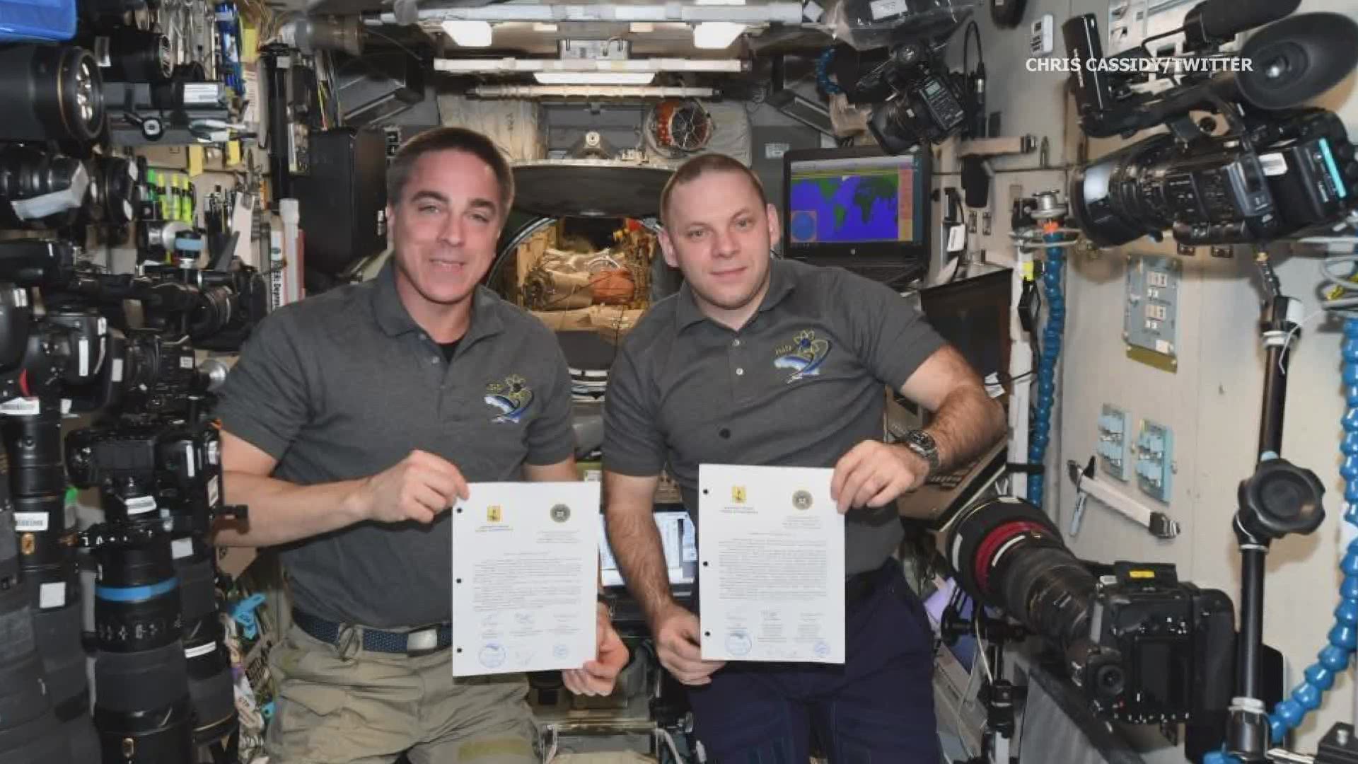 Maine astronaut Chris Cassidy and Russian crewmate receive letter from their hometown regions, which happen to be sister cities