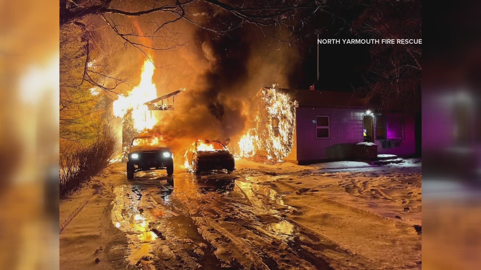 Officials are investigating an overnight fire in North Yarmouth that destroyed a garage and two cars.