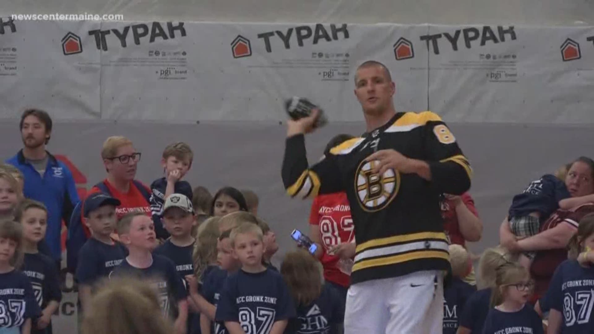 Rob Gronkowski was sporting a Bruins jersey during his visits on Wednesday in support of the fellow Boston team.