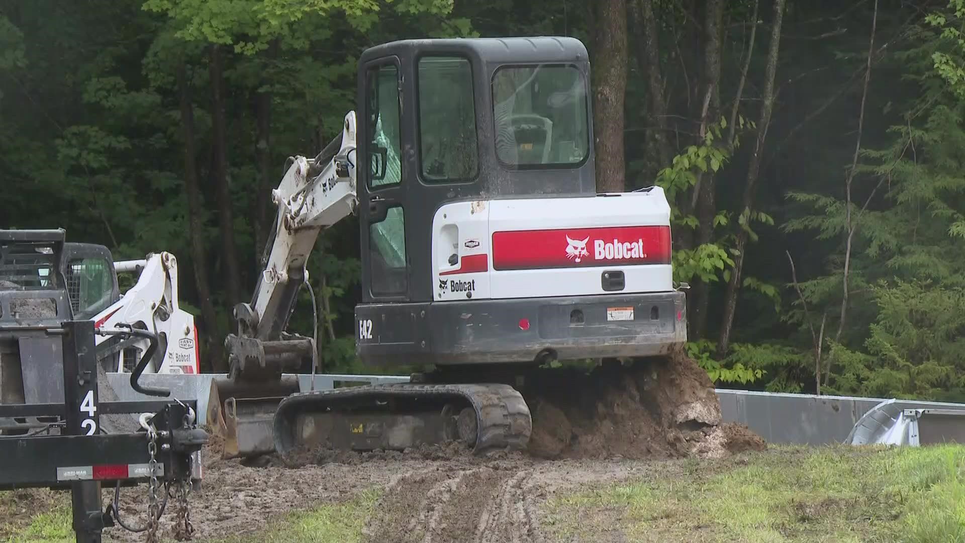 According to police, the workers were installing an in-ground pool at the Auburn home when an excavator overturned, trapping the man under the boom