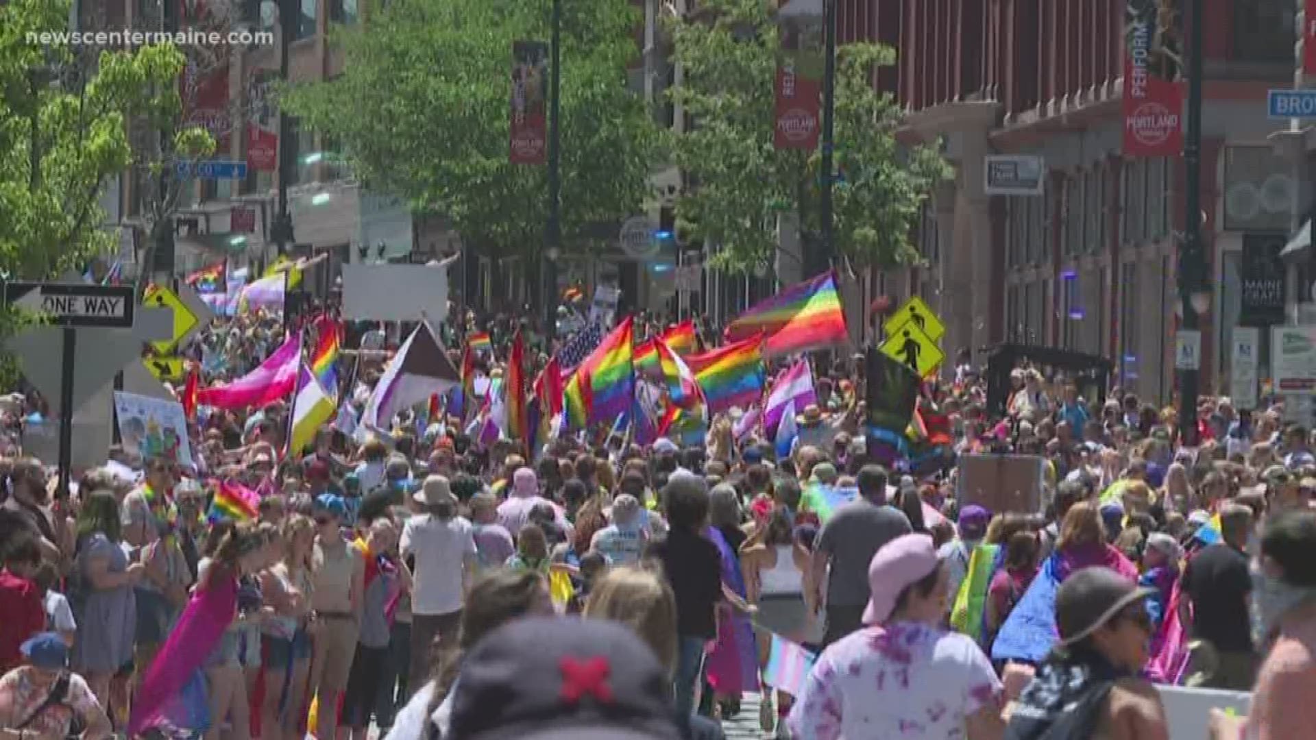 People flooded the streets of Portland to spread messages of love and hope.
