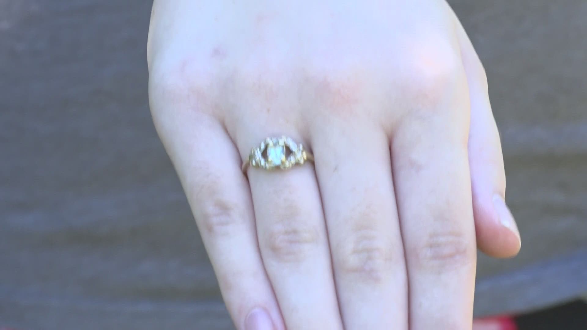 Lost ring found months later wrapped around garlic plant