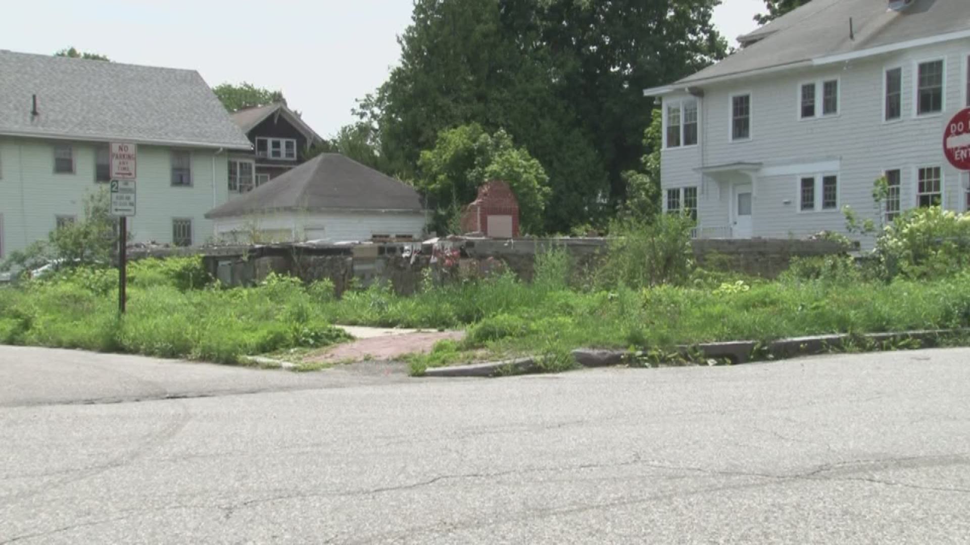 The property where a fire killed six and injured one on Noyes Street in Portland has new owners. They plan to build a duplex and construct a memorial.