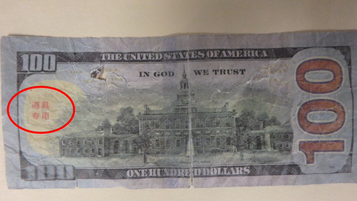 Counterfeit bills marked with Chinese letters being circulated