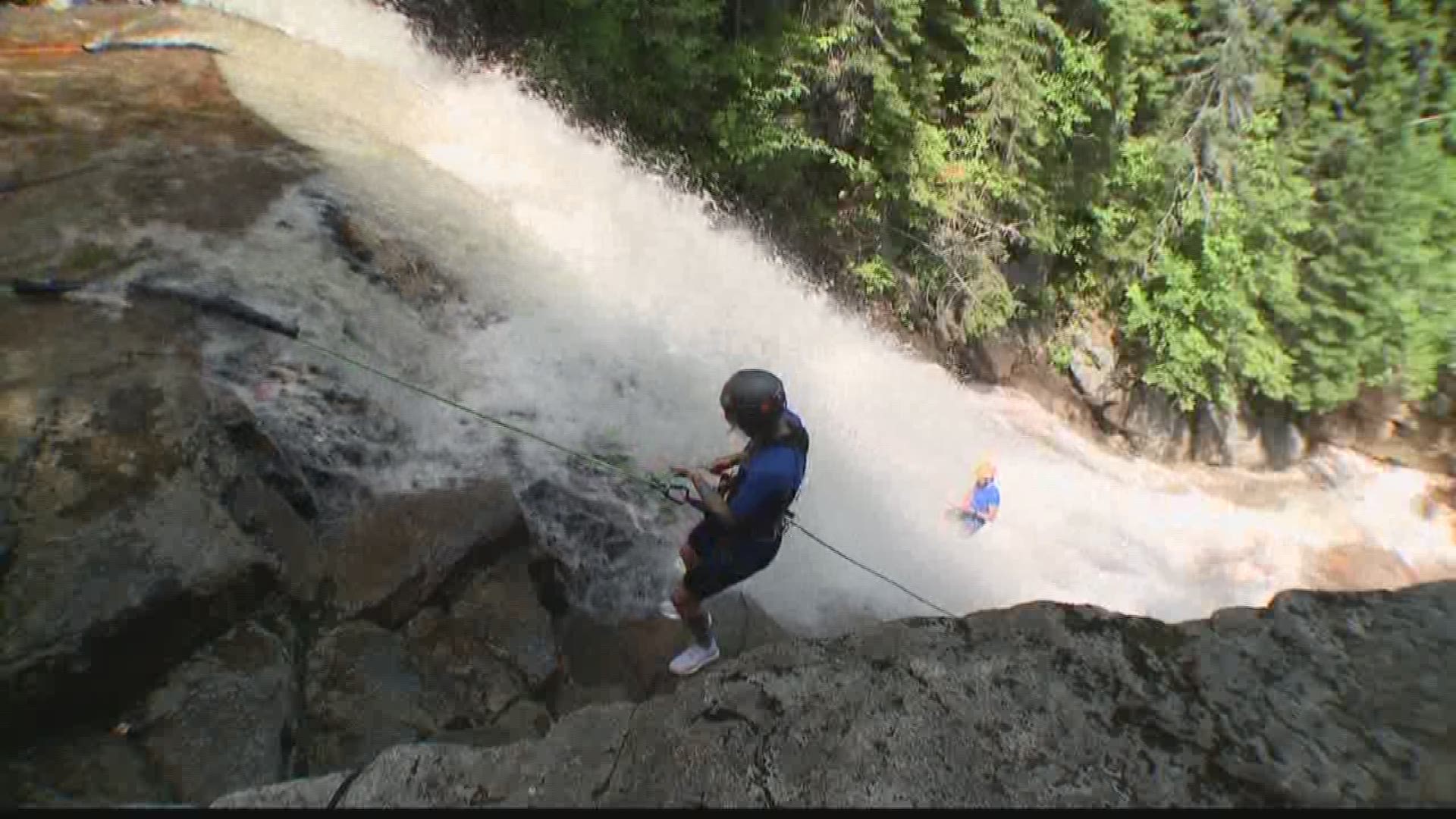 Rappelling down waterfalls in Crawford Notch