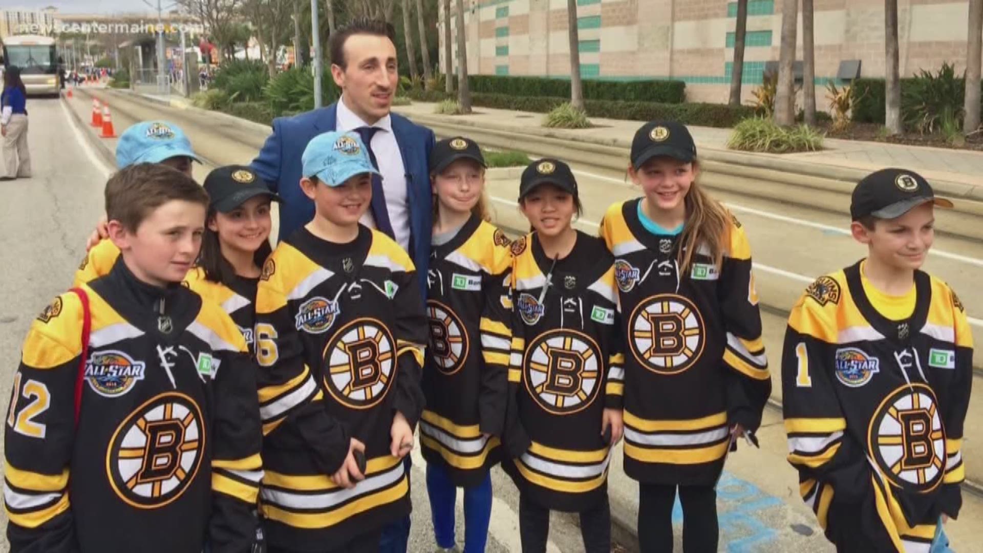 Brad Marchand rewarded four Maine kids with autographed hockey sticks for helping him with his equipment at the airport.