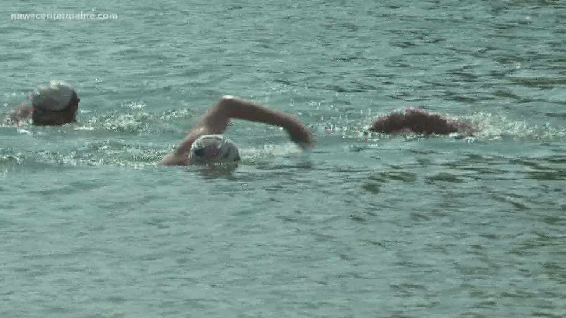Five Navy SEALs swam 16 miles from Long Lake in Bridgton to Sebago Lake in Casco. Their annual swim has raised $500,000 in five years for Camp Sunshine.