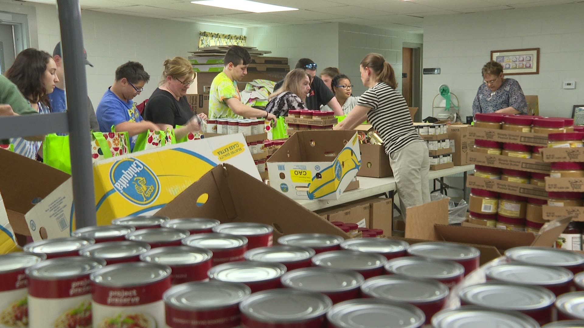 Teenagers from My Place Teen Center are volunteering with Stroudwater Food Pantry to fight hunger in Maine.