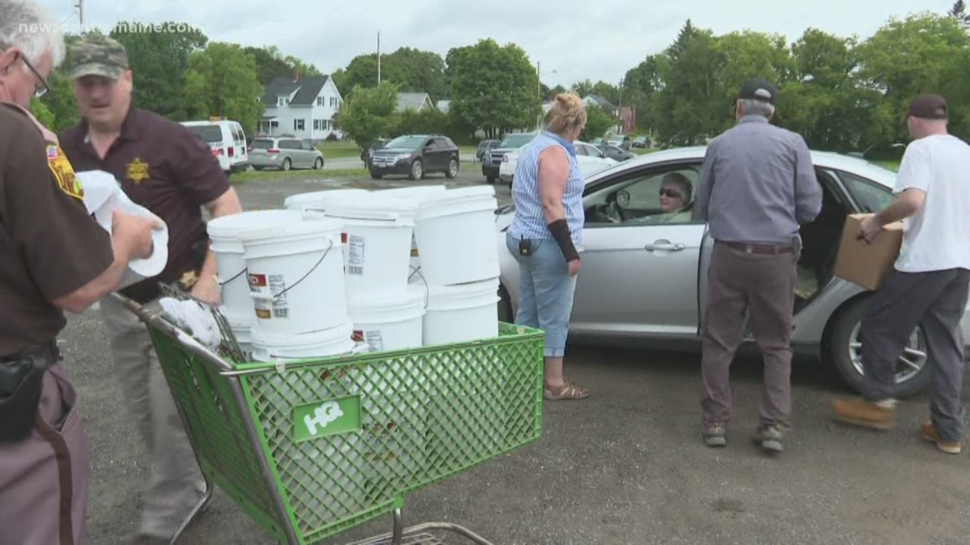 When Dixie Shaw hands out food to seniors in Aroostook County through Catholic Charities, she makes sure to make the drive-though system a party.