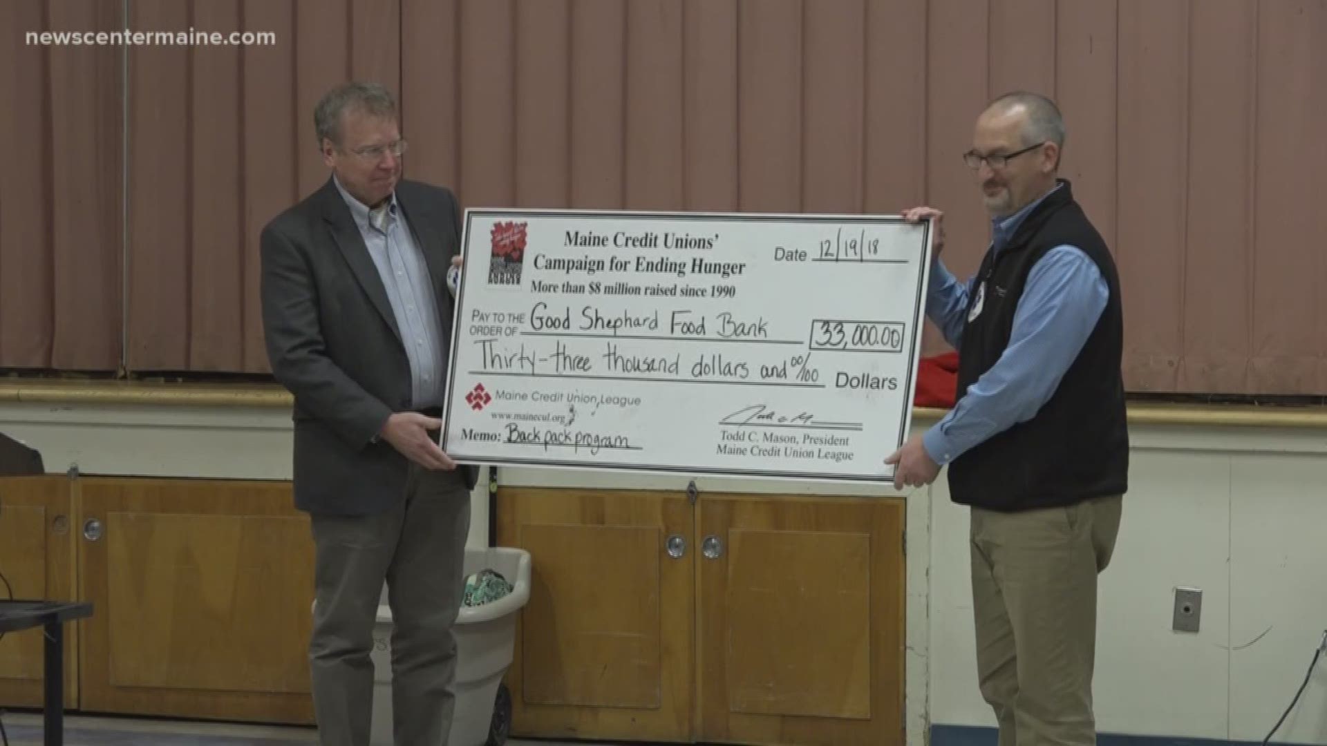Maine Credit Union League donates 33,000 to the Good Shephard Food bank.
