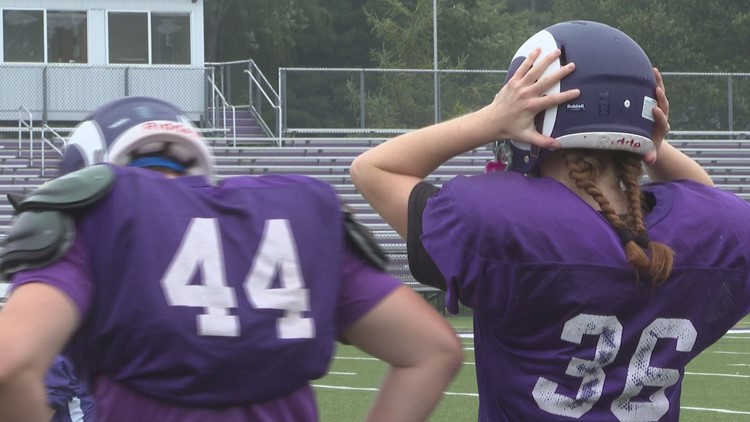 Female football player ready to help the Rams