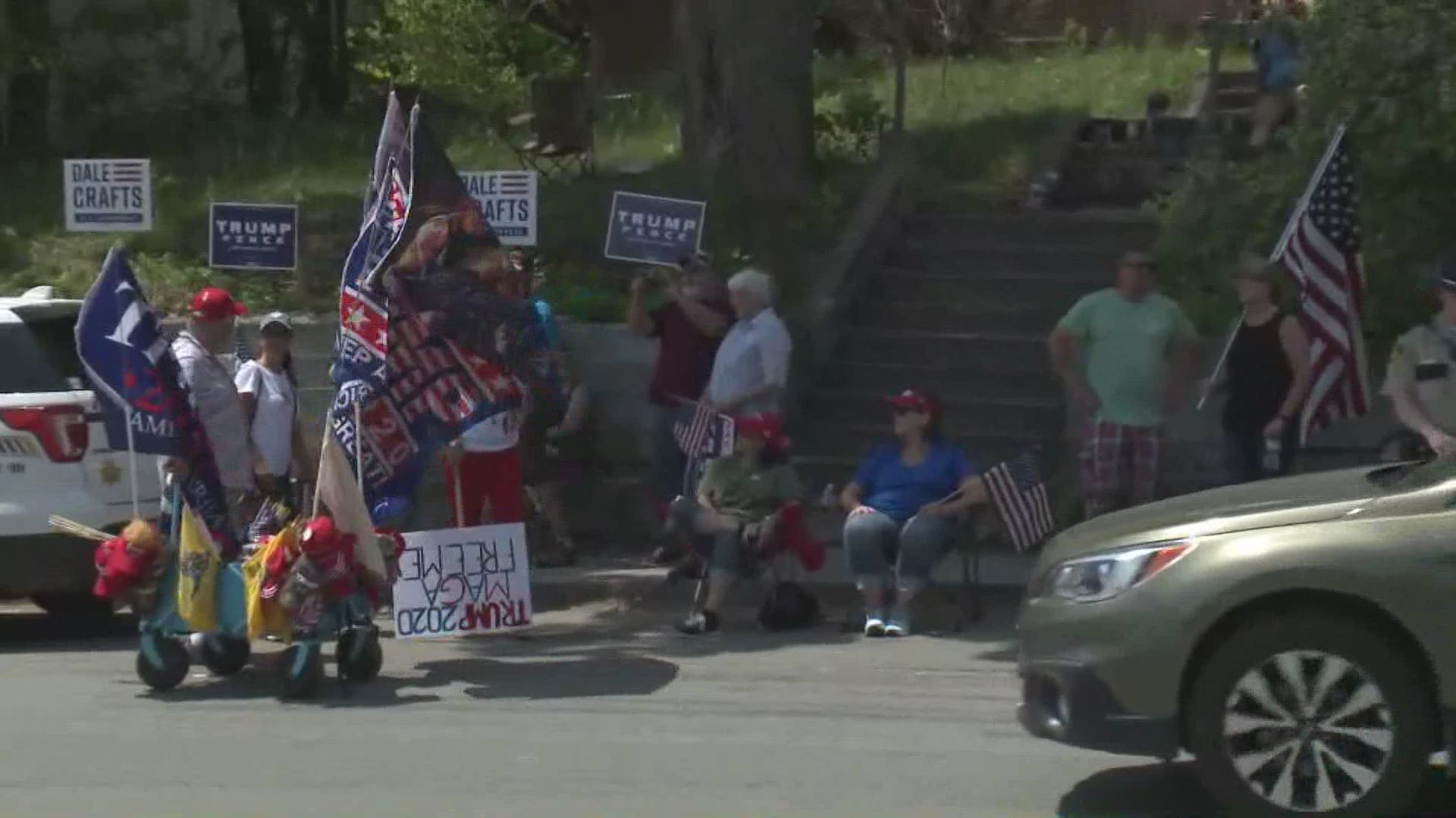 Supporters of President Trump have congregated on the streets of Guilford, excitedly waiting for him to arrive.
