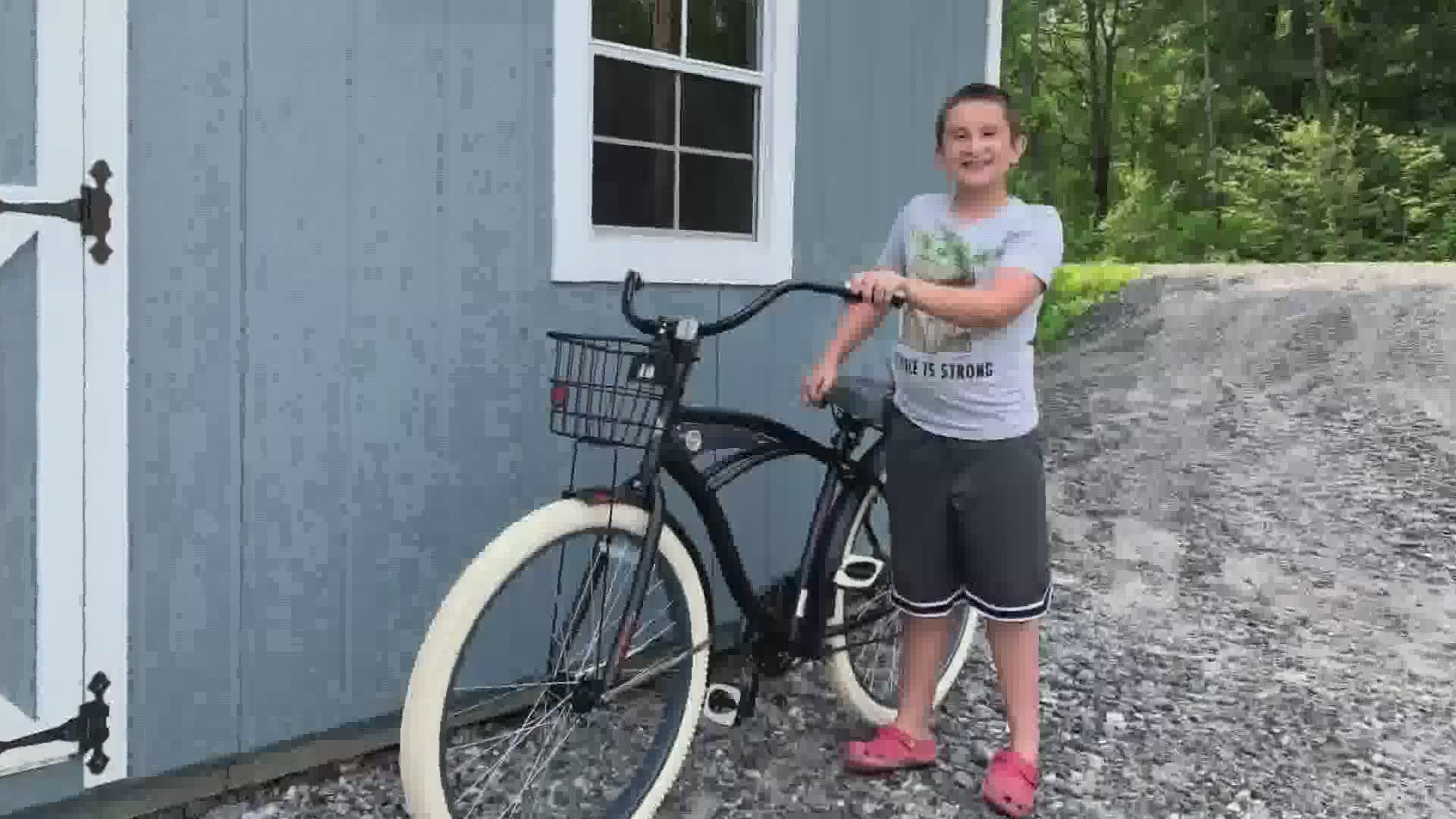 Connor Ridley of Bowdoin is raffling off a bike he won through a reading contest to raise money for Connor Dobbyn, who is battling Sanfilippo syndrome Type C.