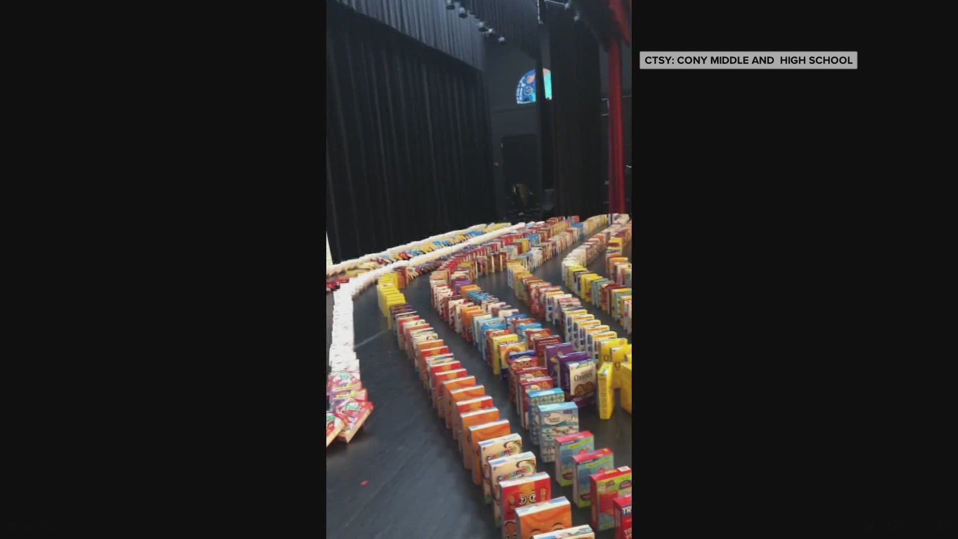 Cony High School created dominoes using 1,000 boxes of cereal to demonstrate the importance of one act of kindness