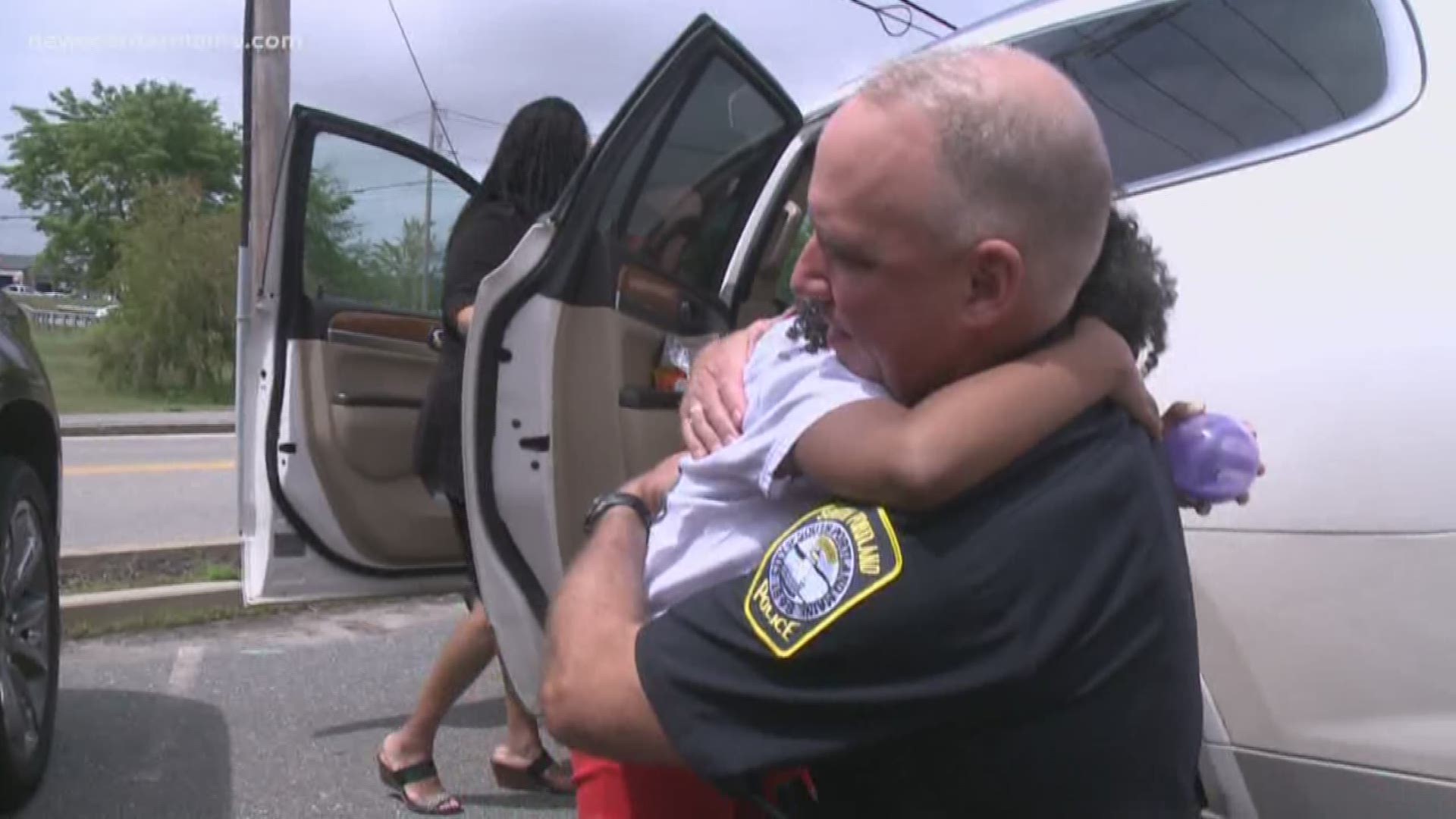 Girl from Louisiana visits Maine on her hug a cop journey