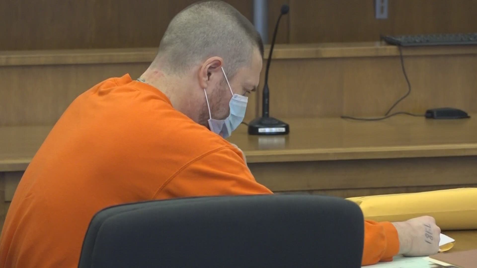 The man accused of killing his father's cat with a frying pan went on trial Tuesday.