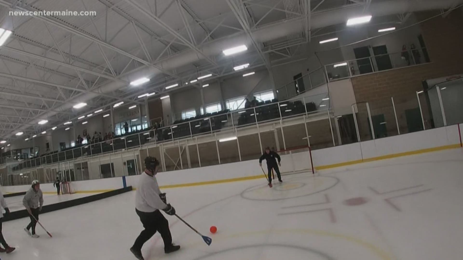 People gather to play Broomball to raise money to fight cancer.
