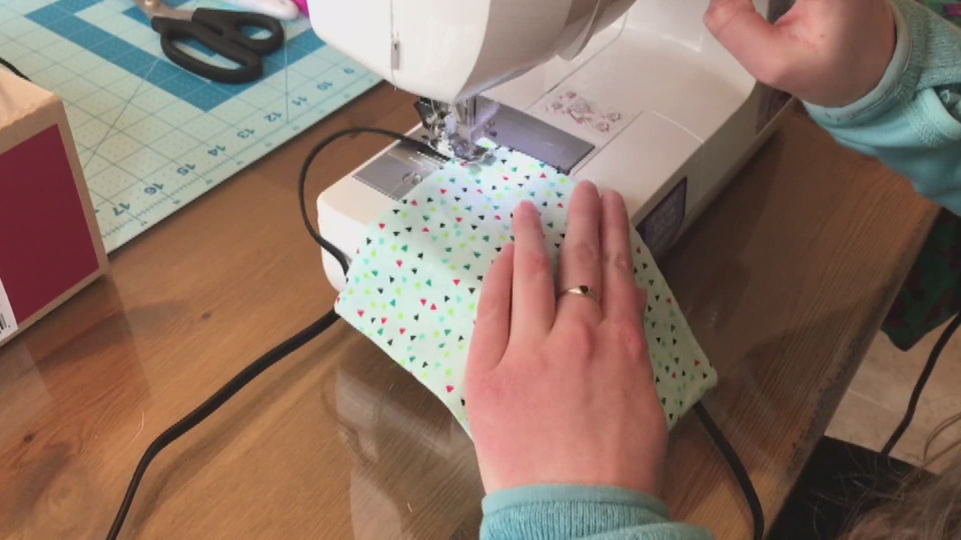 Sewing masks & raising money is helping those in need.