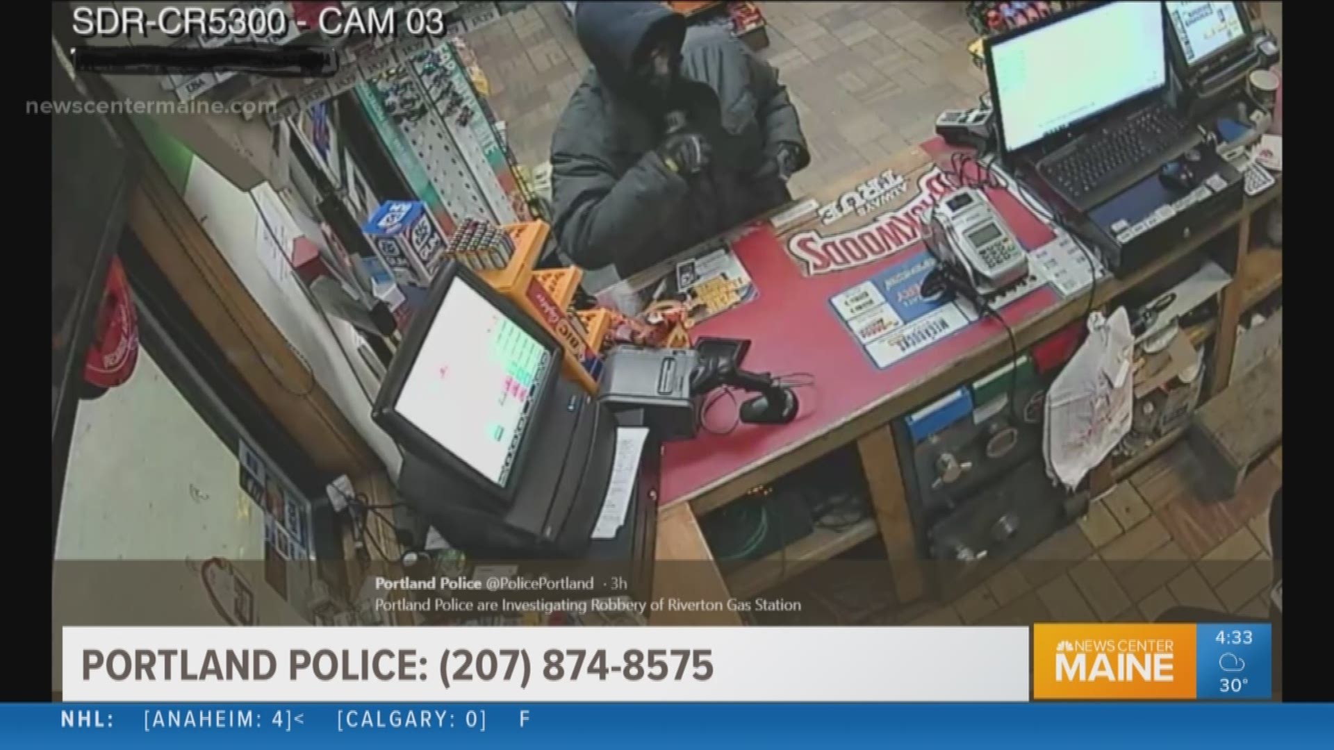 Search underway for armed robbery suspect at Portage gas station