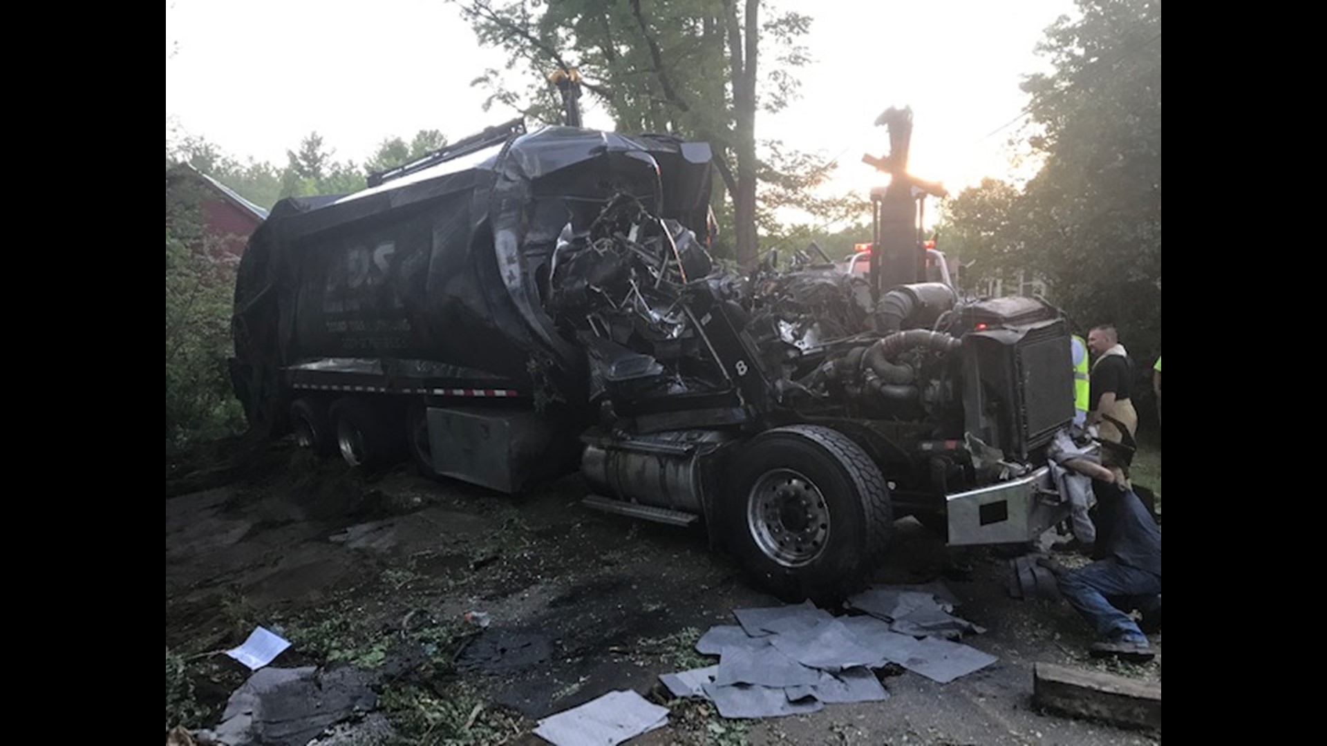 1 killed, another injured in Stoneham garbage truck rollover ...