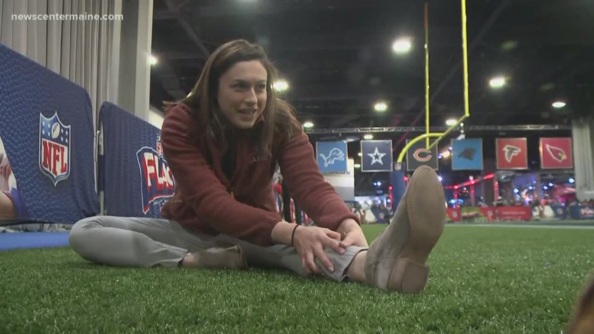 Jess Gagne and Chris Costa have a not-so-friendly competition at the Super Bowl Experience.