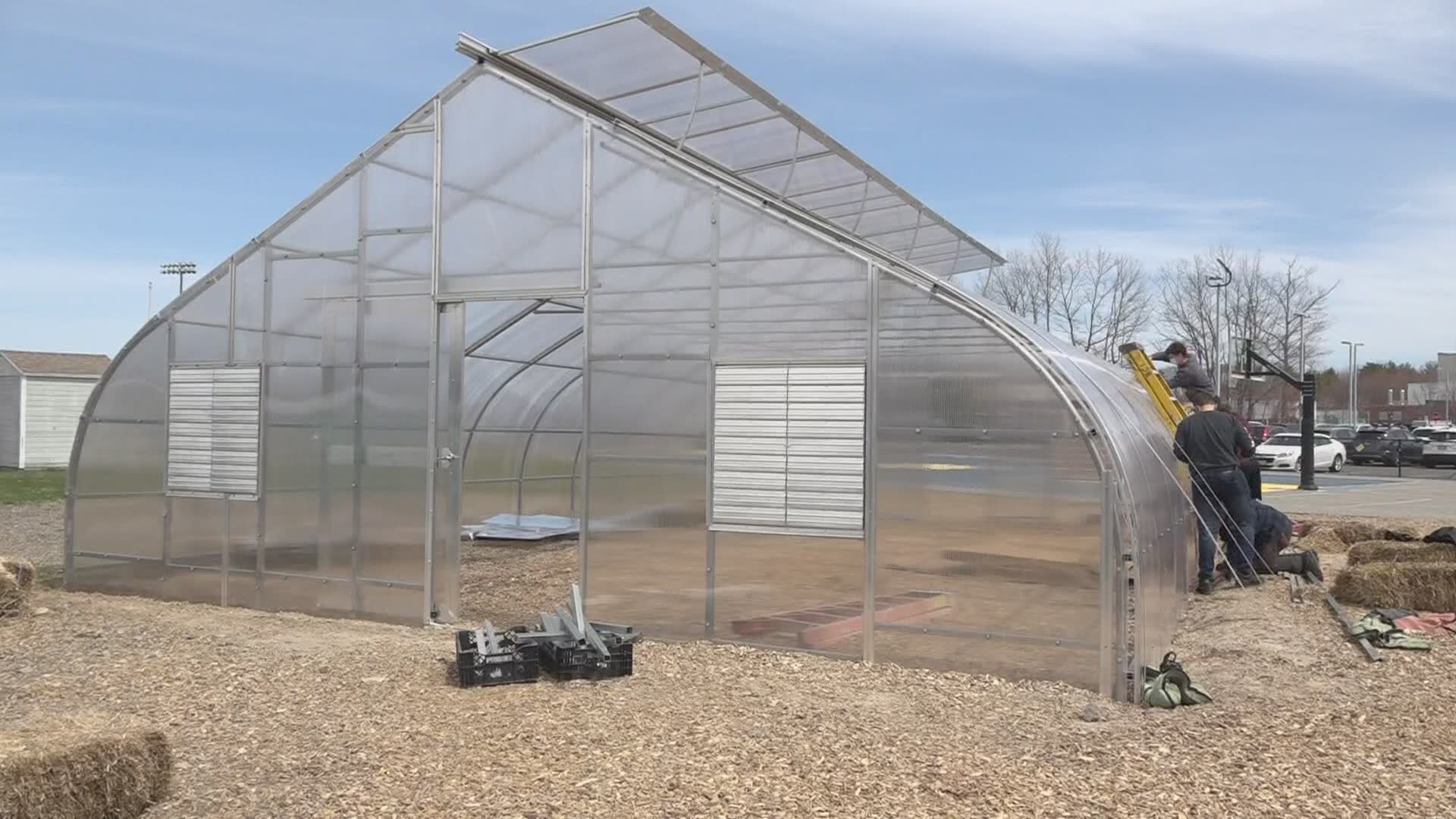 Greenhouses on the Falmouth public school grounds are used as outdoor learning tools turning the pandemic times.