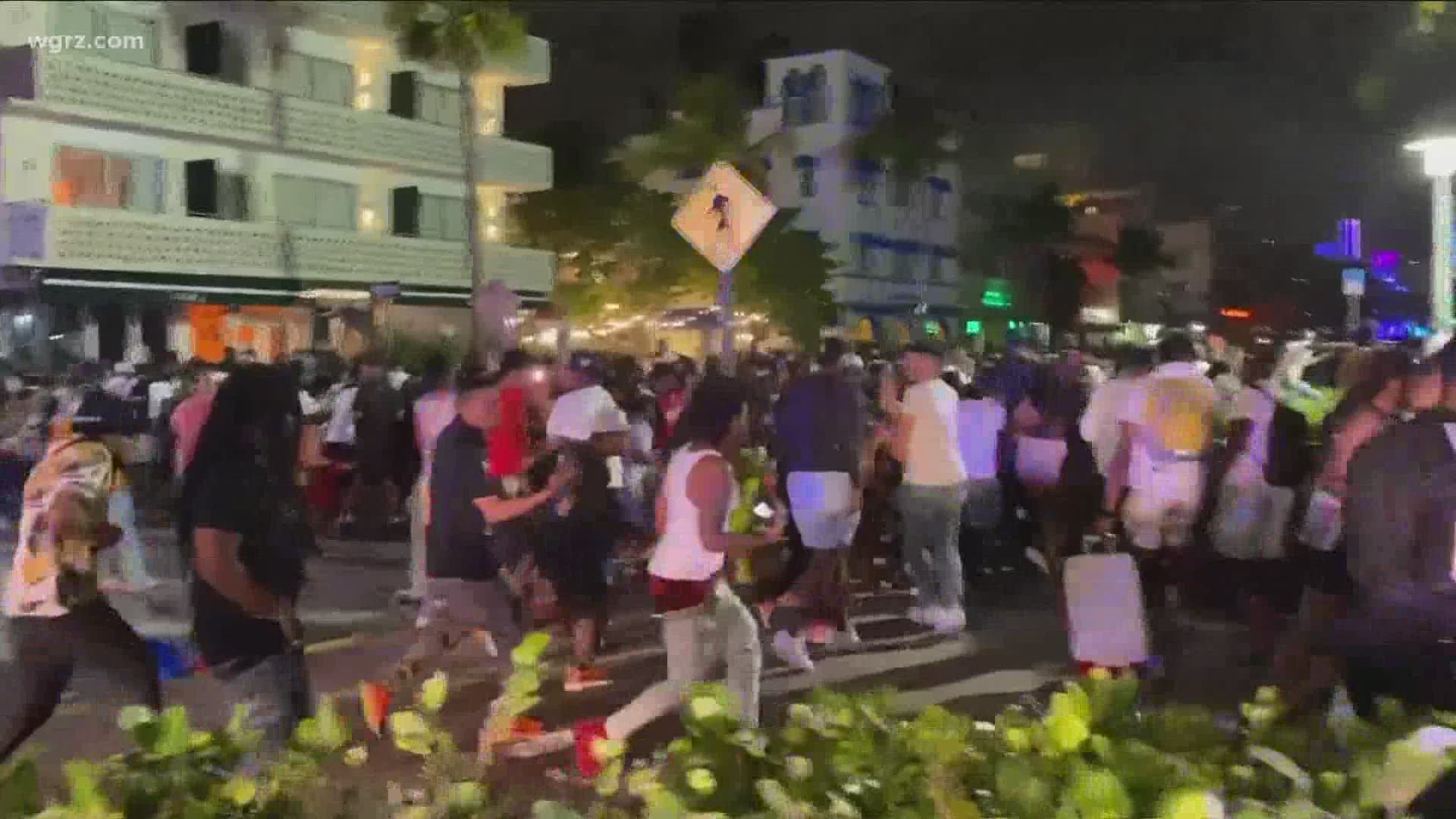Miami Beach began enforcing a curfew Saturday night after crowds of spring breakers descended onto the city.