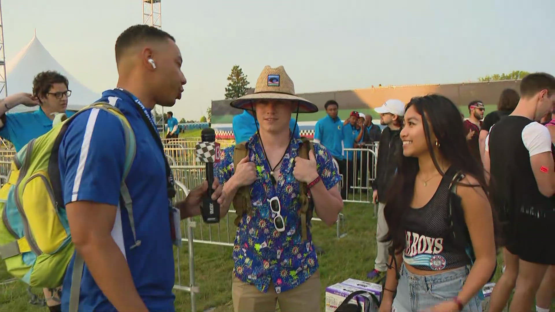 Matthew Fultz talks to some of the first people in line to get in at the Snake Pit, which opens at 7am.