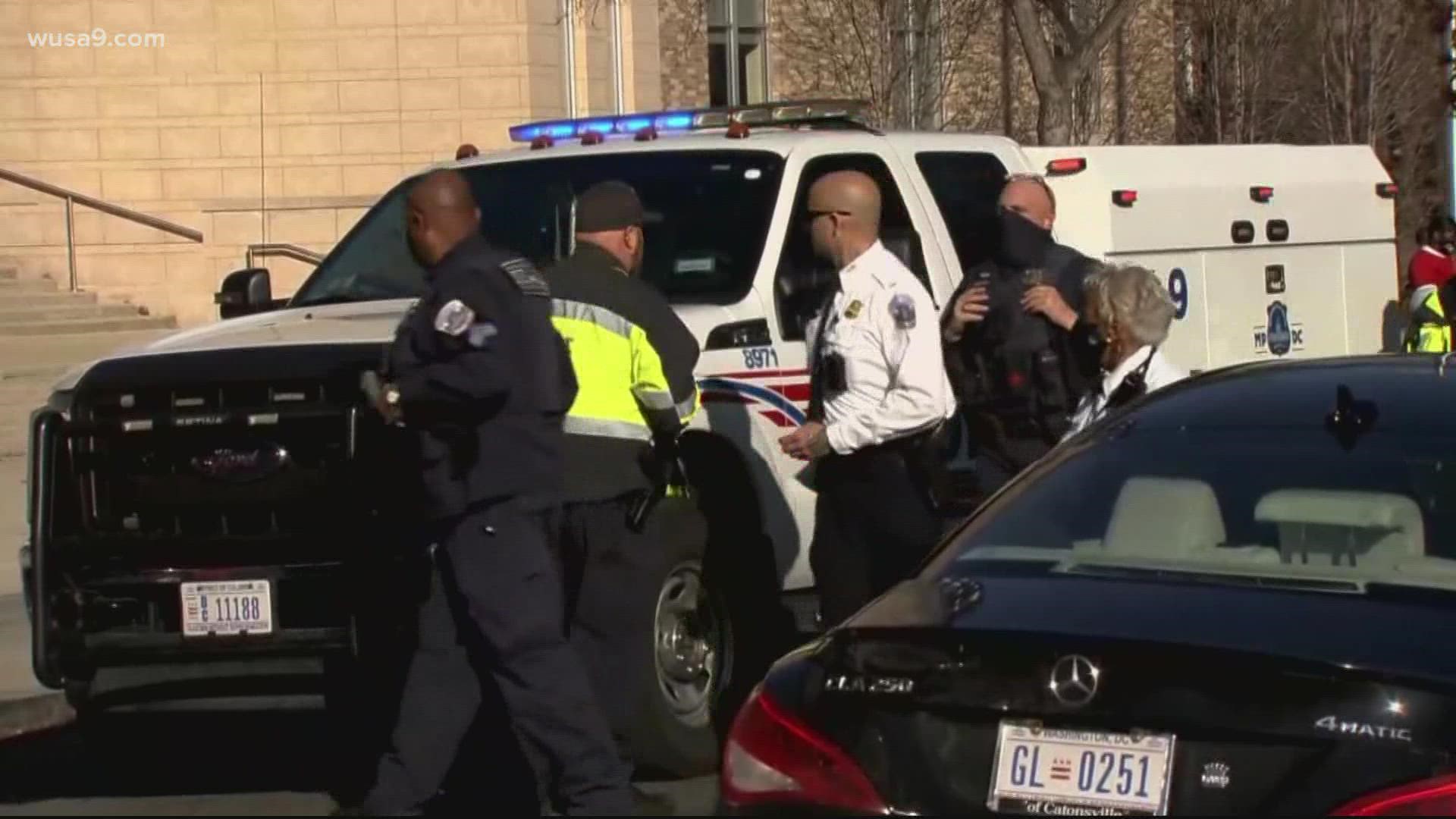 The second gentleman was attending a Black History Month at Dunbar High School when his security team told him "we have to go."